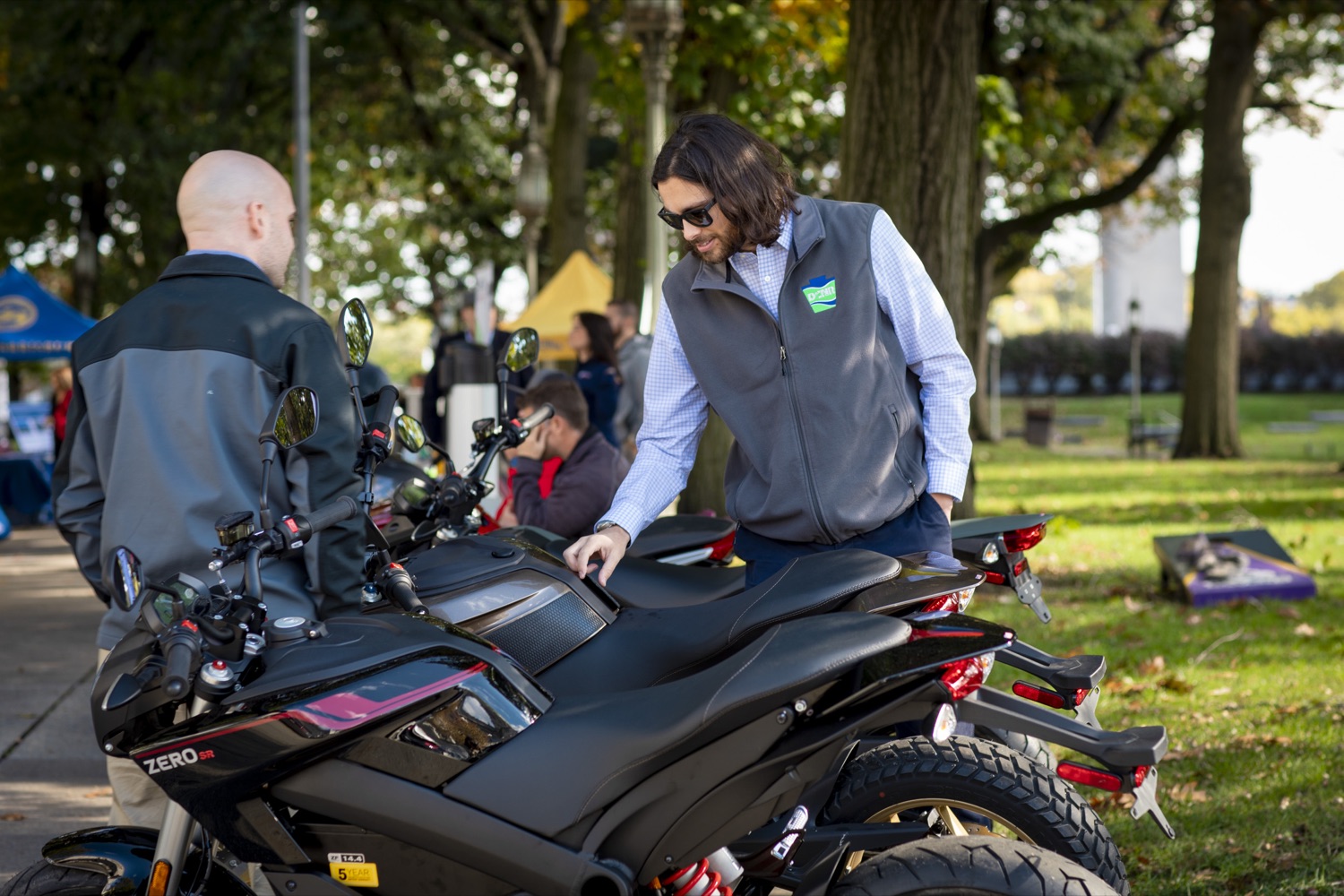 Members of the public interact with displays featuring electric and hybrid technology during a Ride & Drive Event at the Capitol Complex on October 23, 2019.<br><a href="https://filesource.amperwave.net/commonwealthofpa/photo/17449_DGS_DRIVE_ELECTRIC_CZ_08.JPG" target="_blank">⇣ Download Photo</a>