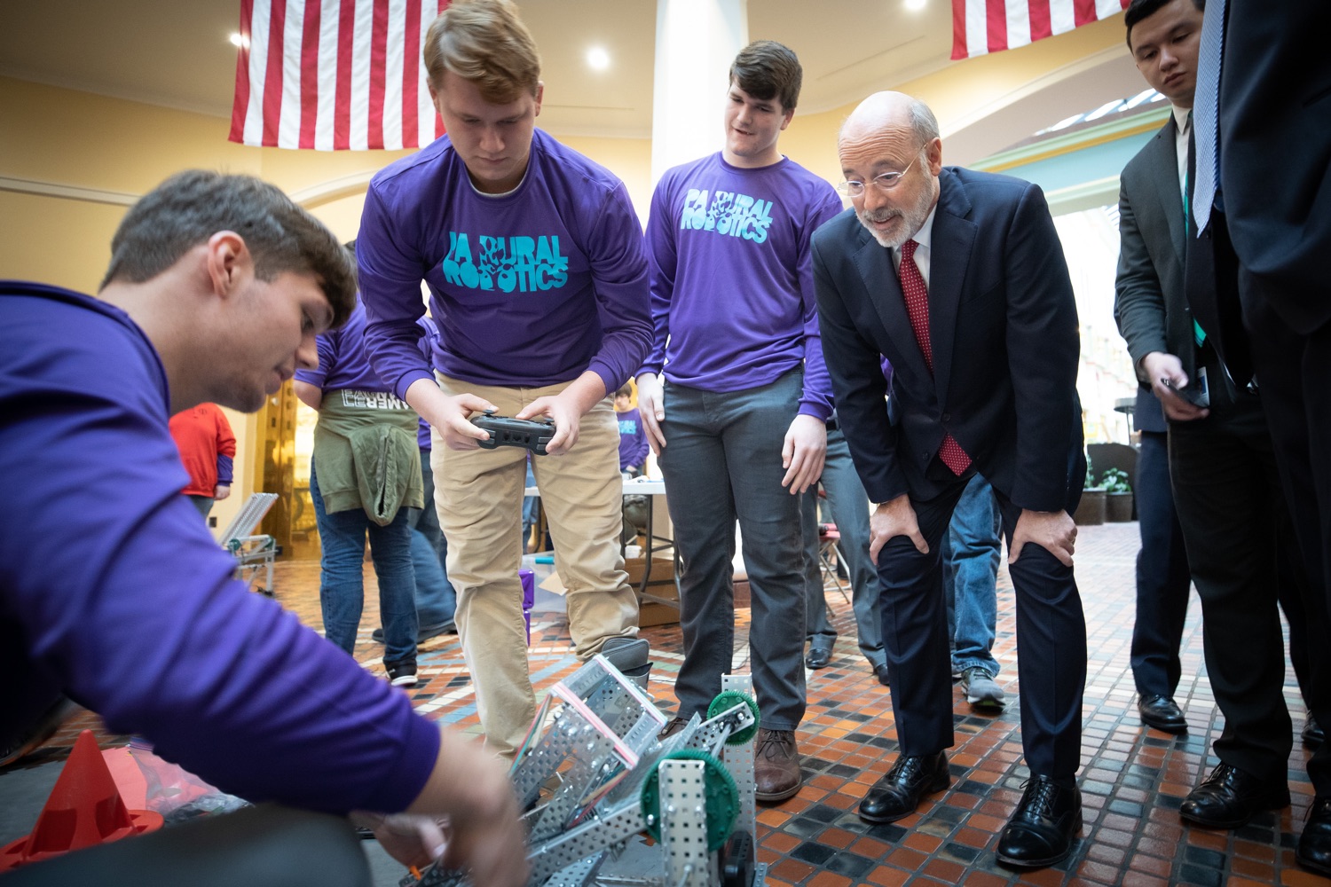 Pennsylvania Governor Tom Wolf meeting with students at the robotics demonstration.  Celebrating the success of the PAsmart workforce development program to create educational opportunities at schools across the commonwealth, Governor Tom Wolf welcomed more than 50 students from the Pennsylvania Rural Robotics Initiative to the Capitol today. The students from nine western Pennsylvania school districts showcased their skills in coding, robotics and drone technology. The Wolf administration awarded the initiative a $299,000 PAsmart Advancing Grant earlier this year. Harrisburg, PA  Tuesday, November 12, 2019<br><a href="https://filesource.amperwave.net/commonwealthofpa/photo/17587_gov_pasmart_rural_robotics_dz_016.jpg" target="_blank">⇣ Download Photo</a>
