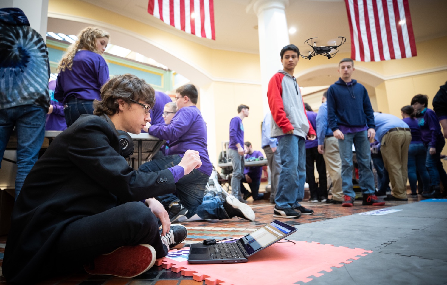 Students fly a drone during the robotics demonstration.  Celebrating the success of the PAsmart workforce development program to create educational opportunities at schools across the commonwealth, Governor Tom Wolf welcomed more than 50 students from the Pennsylvania Rural Robotics Initiative to the Capitol today. The students from nine western Pennsylvania school districts showcased their skills in coding, robotics and drone technology. The Wolf administration awarded the initiative a $299,000 PAsmart Advancing Grant earlier this year. Harrisburg, PA  Tuesday, November 12, 2019<br><a href="https://filesource.amperwave.net/commonwealthofpa/photo/17587_gov_pasmart_rural_robotics_dz_021.jpg" target="_blank">⇣ Download Photo</a>