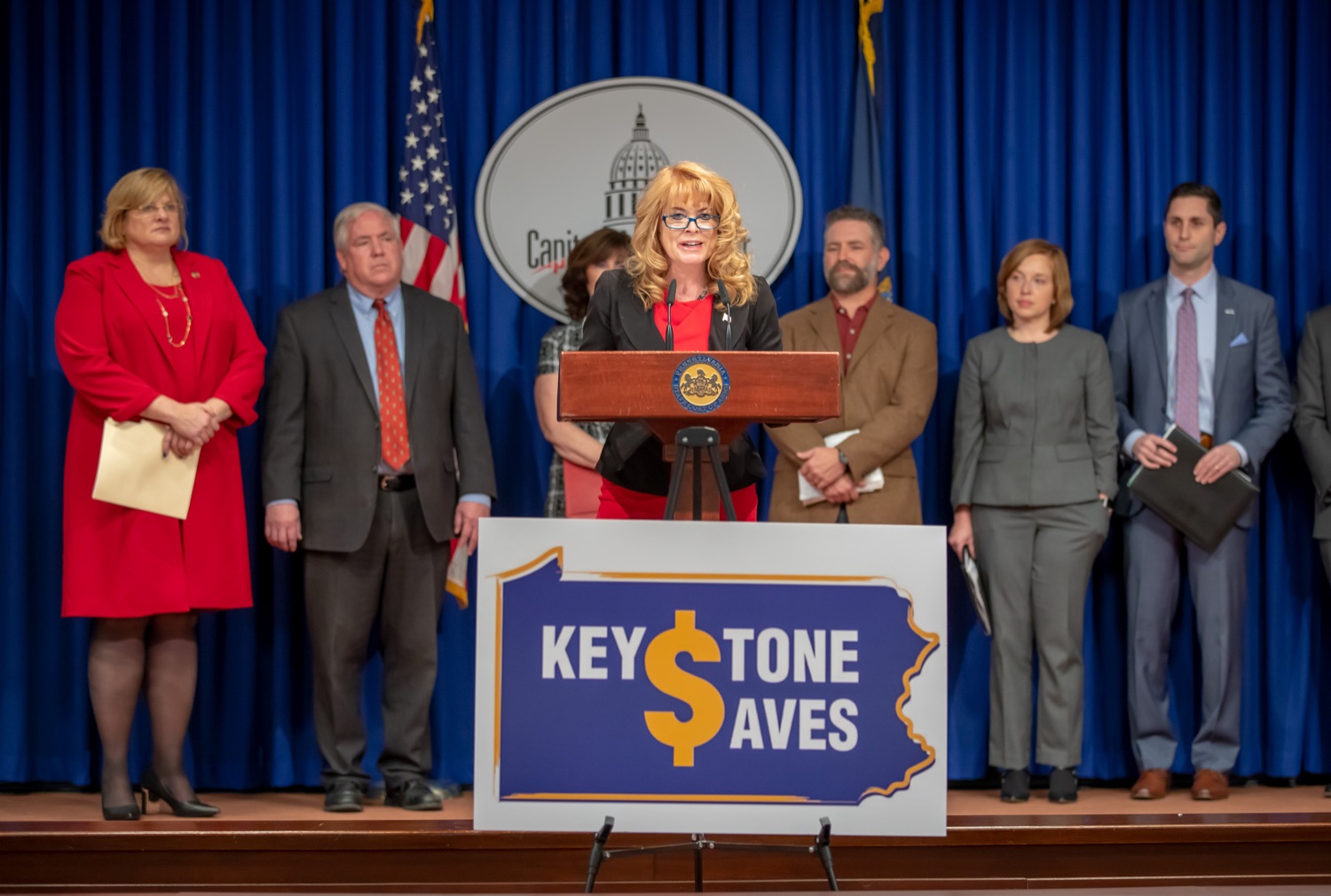 Treasurer Stacy Garrity, Rep. Tracy Pennycuick and Rep. Michael Driscoll announced the upcoming introduction of a bill to create Keystone Saves, a retirement savings program for hardworking Pennsylvanians who do not have access to retirement savings through their employer.  They were joined at the announcement by supporters in the General Assembly and representatives of AARP, the United Way of Pennsylvania, the Pennsylvania Health Care Association, and the Pennsylvania Association of Sustainable Agriculture. Other supporters of Keystone Saves include The Pew Charitable Trusts and the Pennsylvania Institute of CPAs. Harrisburg, PA - December 12, 2021<br><a href="https://filesource.amperwave.net/commonwealthofpa/photo/20293_TREAS_KeystoneSaves_AG_01.jpg" target="_blank">⇣ Download Photo</a>