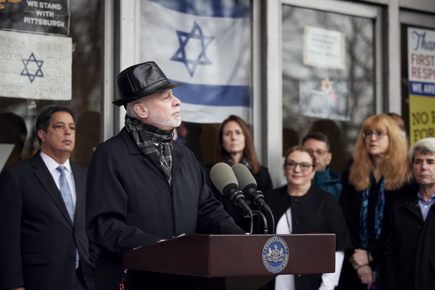 Rabbi Jeffrey Myers speaking with the press.  Governor Tom Wolf visited the Tree of Life in Pittsburgh today to announce $6.6 million in state funding to support the rebuilding and reimagining of the synagogue. The governor was joined by Rabbi Jeffrey Myers, Senate Democratic Leader Jay Costa and members of the Tree of Lifes REMEMBER. REBUILD. RENEW campaign which will transform the site of the worst antisemitic attack in U.S. history into a new place of hope, remembrance, and education. Pittsburgh, PA - December 6, 2021<br><a href="https://filesource.amperwave.net/commonwealthofpa/photo/20308_gov_treeOfLife_dz_010_copy.jpg" target="_blank">⇣ Download Photo</a>