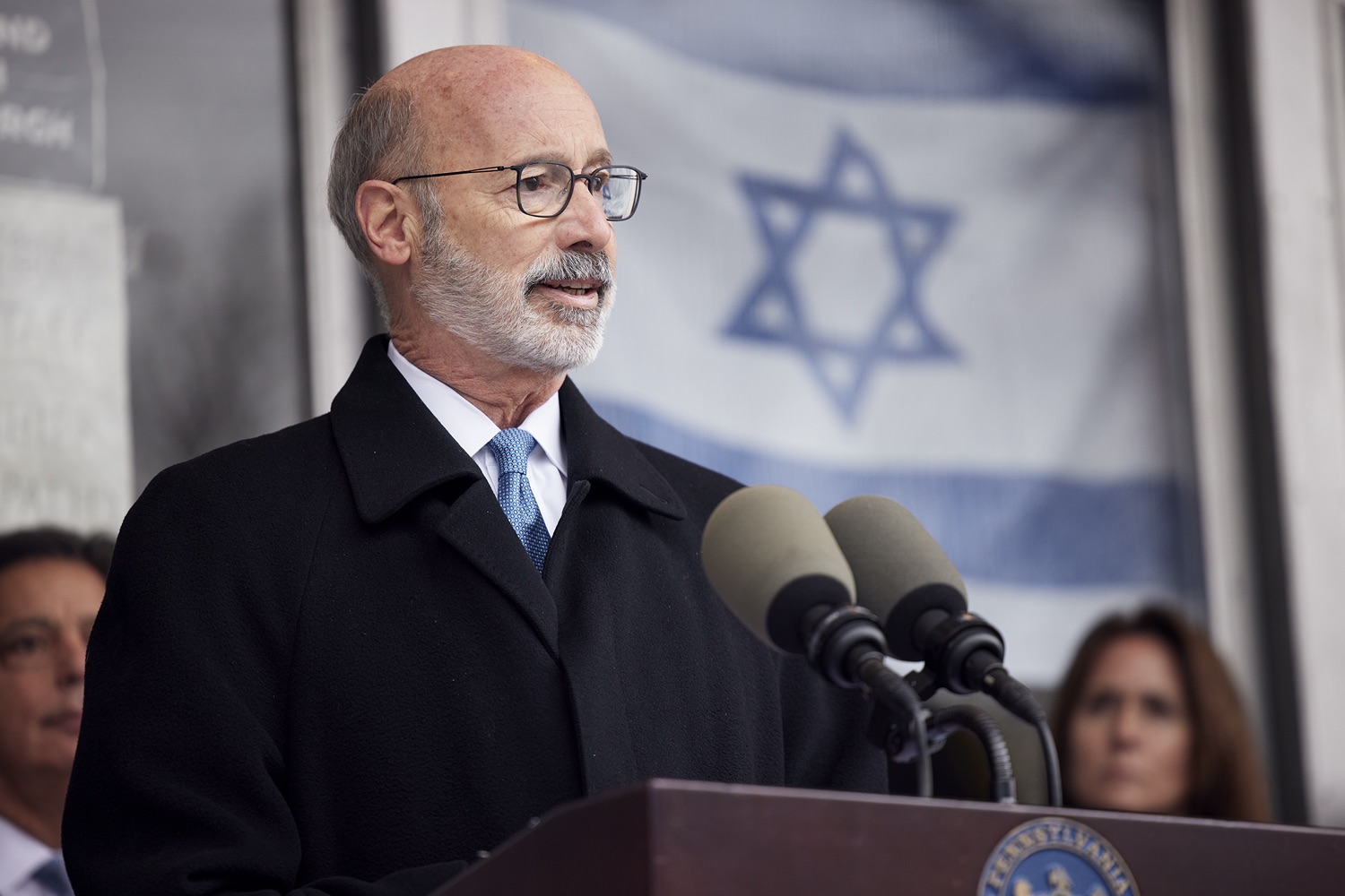 Pennsylvania Governor Tom Wolf speaking with the press.  Governor Tom Wolf visited the Tree of Life in Pittsburgh today to announce $6.6 million in state funding to support the rebuilding and reimagining of the synagogue. The governor was joined by Rabbi Jeffrey Myers, Senate Democratic Leader Jay Costa and members of the Tree of Lifes REMEMBER. REBUILD. RENEW campaign which will transform the site of the worst antisemitic attack in U.S. history into a new place of hope, remembrance, and education. Pittsburgh, PA - December 6, 2021<br><a href="https://filesource.amperwave.net/commonwealthofpa/photo/20308_gov_treeOfLife_dz_014_copy.jpg" target="_blank">⇣ Download Photo</a>