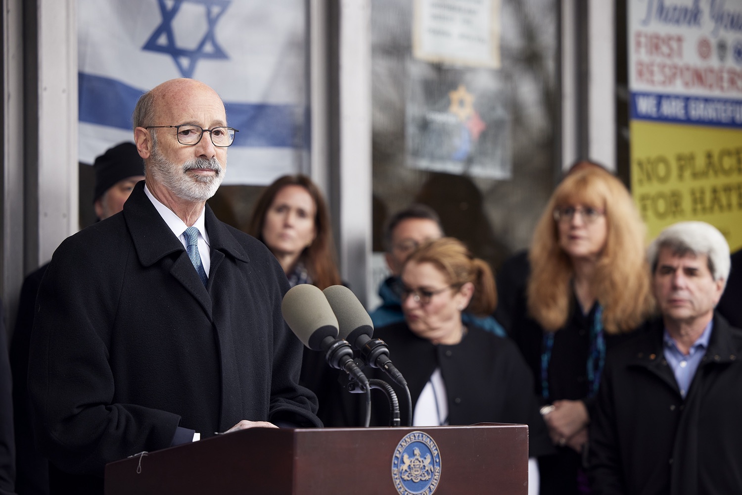 Pennsylvania Governor Tom Wolf speaking with the press.  Governor Tom Wolf visited the Tree of Life in Pittsburgh today to announce $6.6 million in state funding to support the rebuilding and reimagining of the synagogue. The governor was joined by Rabbi Jeffrey Myers, Senate Democratic Leader Jay Costa and members of the Tree of Lifes REMEMBER. REBUILD. RENEW campaign which will transform the site of the worst antisemitic attack in U.S. history into a new place of hope, remembrance, and education. Pittsburgh, PA - December 6, 2021<br><a href="https://filesource.amperwave.net/commonwealthofpa/photo/20308_gov_treeOfLife_dz_015_copy.jpg" target="_blank">⇣ Download Photo</a>