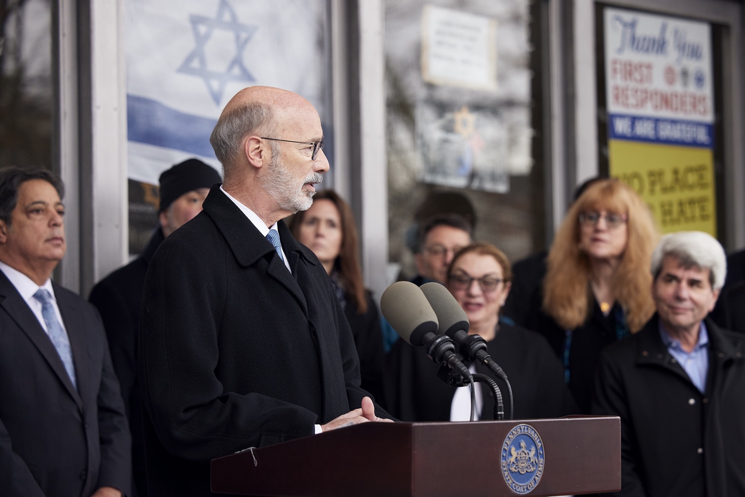 Pennsylvania Governor Tom Wolf speaking with the press.  Governor Tom Wolf visited the Tree of Life in Pittsburgh today to announce $6.6 million in state funding to support the rebuilding and reimagining of the synagogue. The governor was joined by Rabbi Jeffrey Myers, Senate Democratic Leader Jay Costa and members of the Tree of Lifes REMEMBER. REBUILD. RENEW campaign which will transform the site of the worst antisemitic attack in U.S. history into a new place of hope, remembrance, and education. Pittsburgh, PA - December 6, 2021<br><a href="https://filesource.amperwave.net/commonwealthofpa/photo/20308_gov_treeOfLife_dz_018_copy.jpg" target="_blank">⇣ Download Photo</a>