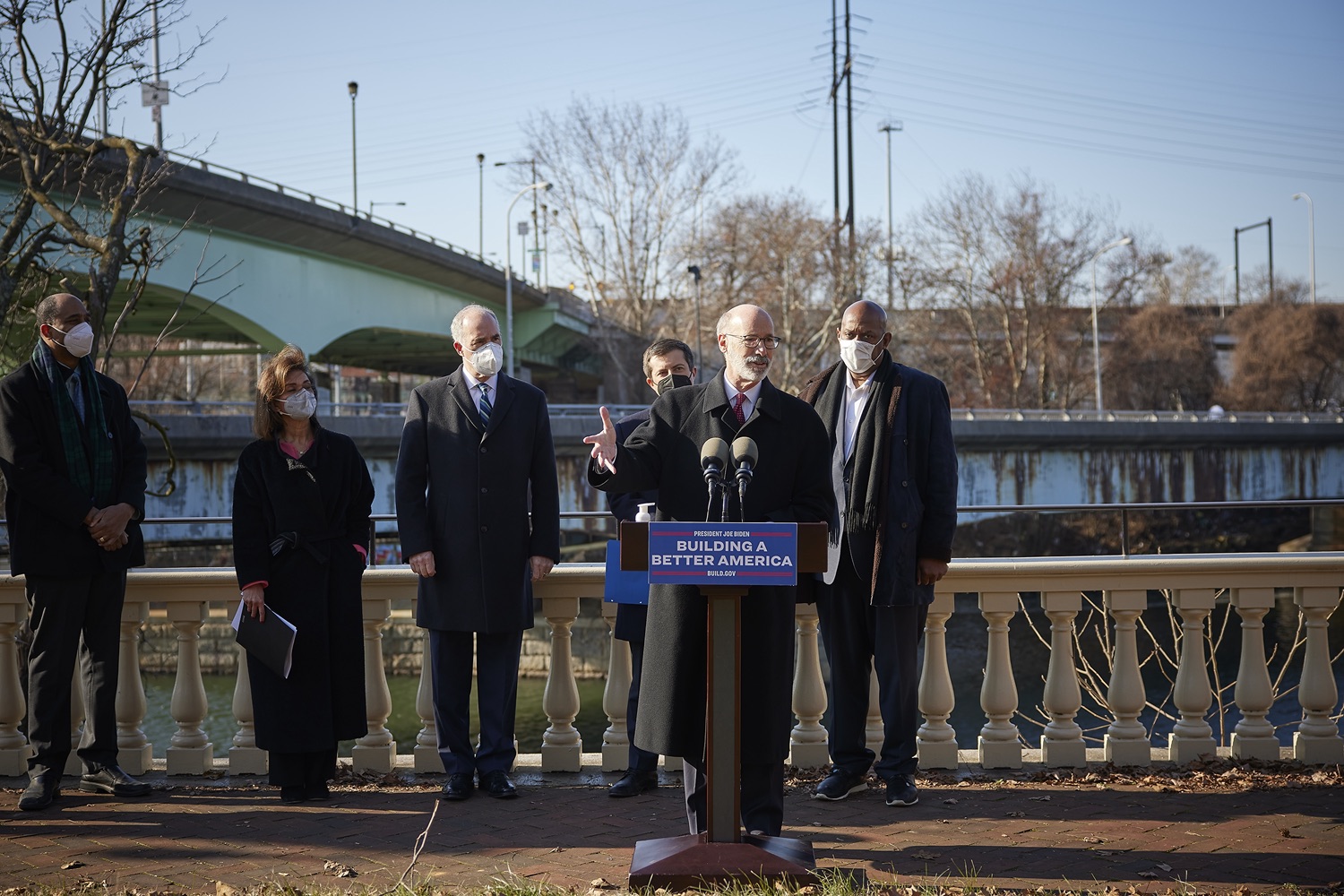 Pennsylvania Governor Tom Wolf speaks with the press.  Governor Tom Wolf stood alongside U.S. Transportation Secretary Pete Buttigieg to launch the largest bridge formula program in American history, made possible by the passage of the Bipartisan Infrastructure Law. Pennsylvania is set to receive $1.6 billion to fix more than 3,000 bridges across the commonwealth.  Philadelphia, PA  January 14, 2021<br><a href="https://filesource.amperwave.net/commonwealthofpa/photo/20426_gov_bridgeAnnoucement_dz_022_copy.jpg" target="_blank">⇣ Download Photo</a>