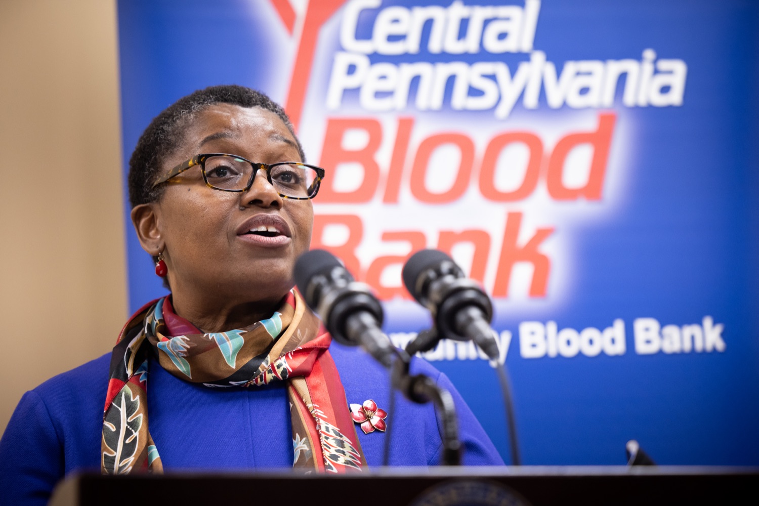 Physician General Dr. Denise A. Johnson speaks with the press.  Pennsylvania Physician General Dr. Denise Johnson and Patrick Bradley, President and CEO of the Central Pennsylvania Blood Bank, expressed their growing concern over the dramatically decreasing number of volunteers who regularly donate blood, during a news conference highlighting the critical need for blood donation across the commonwealth.  February 03, 2022 - Hummelstown, Pa<br><a href="https://filesource.amperwave.net/commonwealthofpa/photo/20488_doh_bloodShortage_dz_010.jpg" target="_blank">⇣ Download Photo</a>