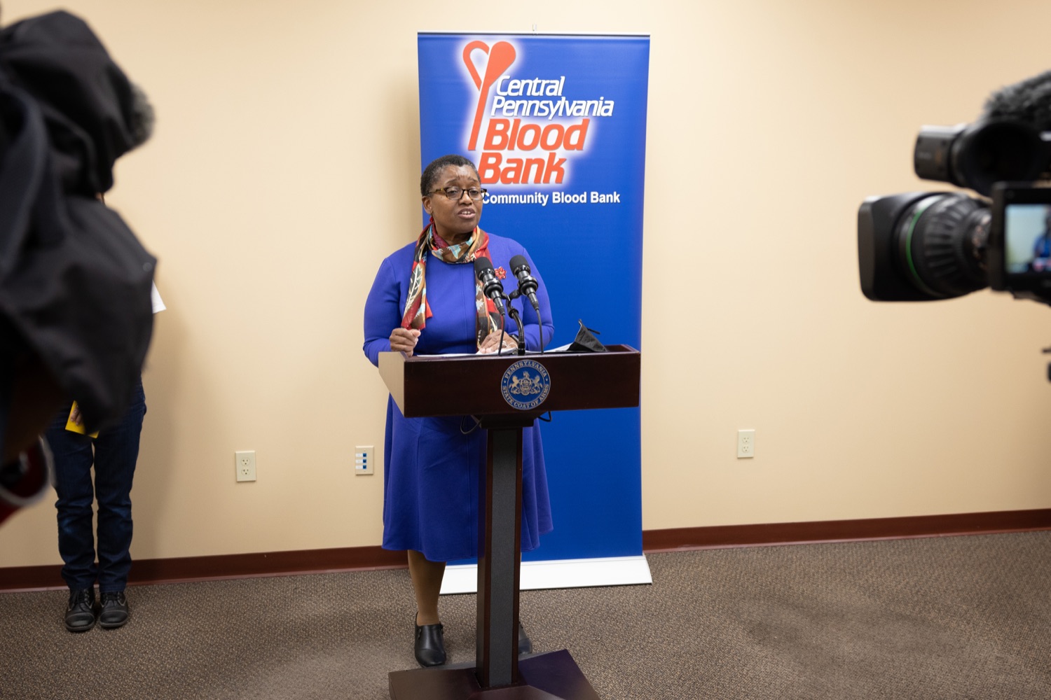 Physician General Dr. Denise A. Johnson speaks with the press.  Pennsylvania Physician General Dr. Denise Johnson and Patrick Bradley, President and CEO of the Central Pennsylvania Blood Bank, expressed their growing concern over the dramatically decreasing number of volunteers who regularly donate blood, during a news conference highlighting the critical need for blood donation across the commonwealth.  February 03, 2022 - Hummelstown, Pa<br><a href="https://filesource.amperwave.net/commonwealthofpa/photo/20488_doh_bloodShortage_dz_019.jpg" target="_blank">⇣ Download Photo</a>