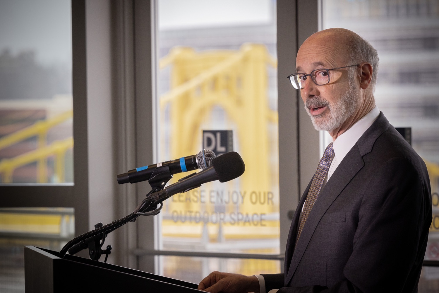 Pennsylvania Governor Tom Wolf speaks with the press.  Governor Tom Wolf and Pennsylvania Department of Transportation (PennDOT) Deputy Secretary for Multimodal Transportation Jennie Louwerse were joined by Federal Railroad Administration Administrator Amit Bose, Norfolk Southern (NS) Regional Vice President Rudy Husband and local officials today to announce that the federal Bipartisan Infrastructure Law (BIL) has paved the way for movement toward improved freight and passenger-rail service between Harrisburg and Pittsburgh. Pittsburgh, PA  February 18, 2022<br><a href="https://filesource.amperwave.net/commonwealthofpa/photo/20547_gov_infrastructure_dz_001.jpg" target="_blank">⇣ Download Photo</a>