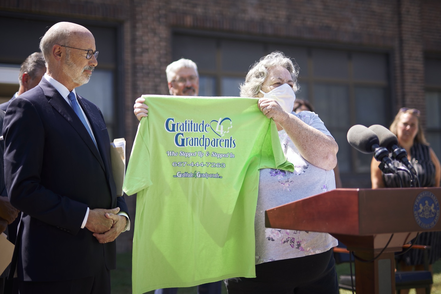 Pennsylvania Governor Tom Wolf receives a tee shirt from Angie Carr, a client of the food pantry.   Governor Tom Wolf was joined by state Representative David Delloso and stakeholders and community members to discuss the reintroduction of the PA Opportunity Program, which would send $2,000 checks directly to Pennsylvanians. I first proposed the PA Opportunity Program back in February, but Republican leaders in the General Assembly just wouldnt get on board with funding it in this years budget, said Gov. Wolf. However, as Ive traveled the commonwealth, Ive heard directly from so many people about how much this program would mean to them and their families. Im not going to stop fighting until the people of Pennsylvania get the help they need and deserve. Folcroft, PA  August 2, 2022<br><a href="https://filesource.amperwave.net/commonwealthofpa/photo/22070_gov_opportunityFund_dz_014.JPG" target="_blank">⇣ Download Photo</a>