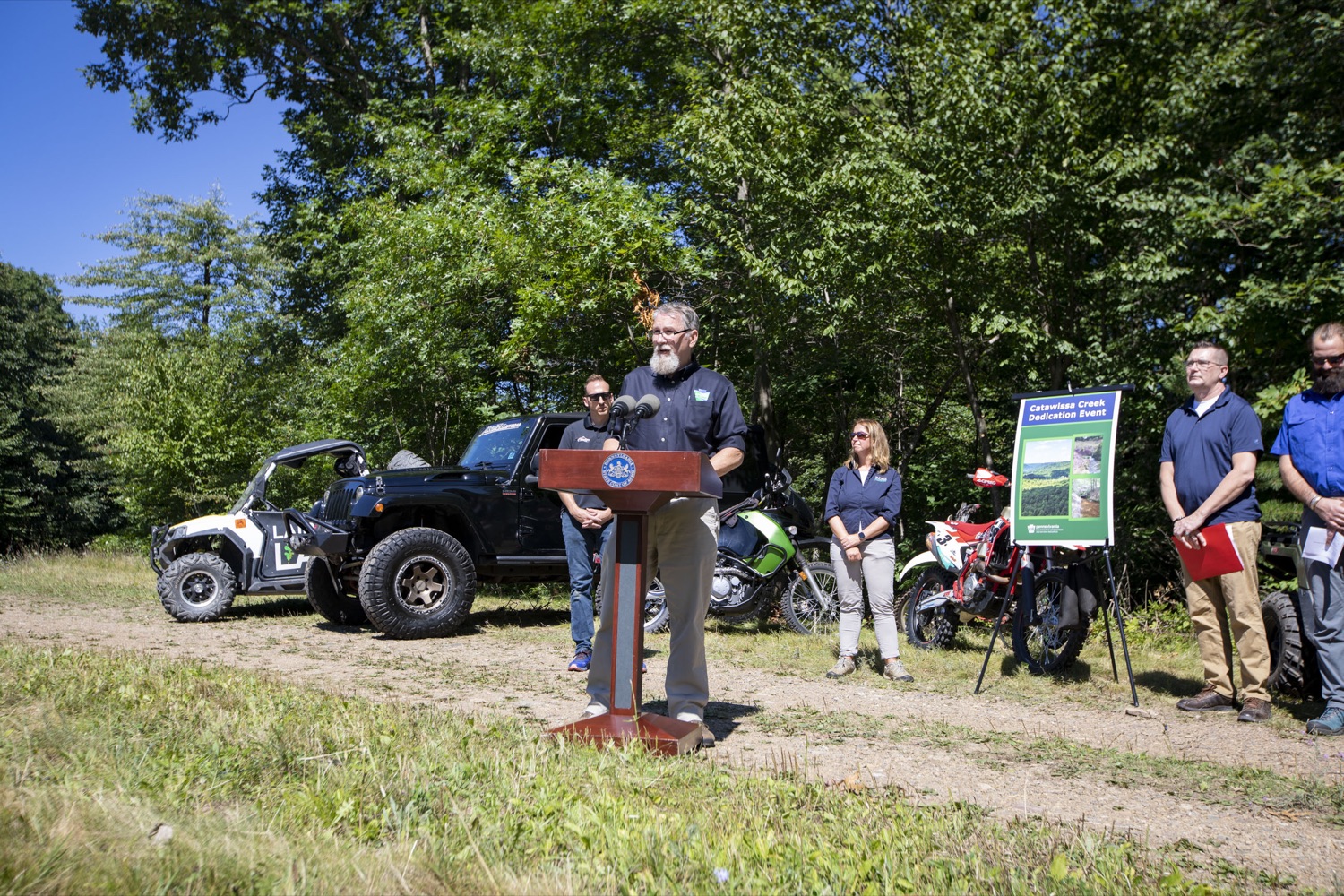 DCNR Deputy Secretary John Norbeck discusses the acquisition of a 5,600-acre tract of land that will be developed into a new motorized recreation area, in McAdoo, PA on August 12, 2022.<br><a href="https://filesource.amperwave.net/commonwealthofpa/photo/22090_dcnr_RecreationArea_10.jpg" target="_blank">⇣ Download Photo</a>