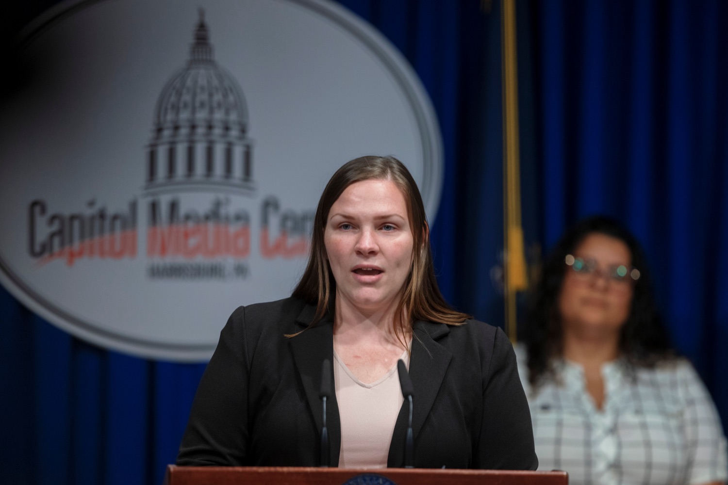 Moriah Hathaway, executive director of the Commission for Women, speaks during a press conference, which highlighted the Wolf Administrations efforts to expand voter access, inside the Capitol Media Center on Tuesday, September 13, 2022. The press conference reminded Pennsylvanians Oct 24. is the deadline to register to vote in the November election. Whether a voter is requesting a no-excuse mail-in ballot from the comfort of their home or showing up to the polls on Election Day and proudly wearing an I voted sticker, voting is a constitutional right and a way for people to make their voice heard, Acting Secretary of State Leigh M. Chapman said. I am honored to be part of an administration that continues to work hard so everyone has equal access to the ballot box. .<br><a href="https://filesource.amperwave.net/commonwealthofpa/photo/22138_CFW_VotingPA_NK_016.JPG" target="_blank">⇣ Download Photo</a>