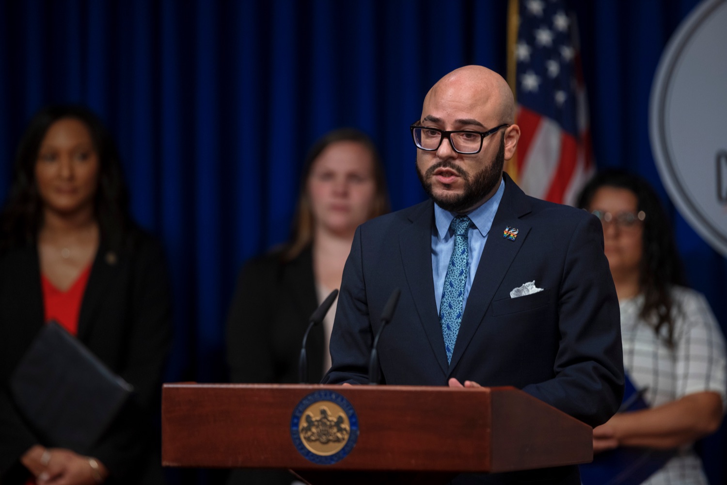 Rafael Alvarez Febo, executive director of the Commission on LGBTQ Affairs, speaks during a press conference, which highlighted the Wolf Administrations efforts to expand voter access, inside the Capitol Media Center on Tuesday, September 13, 2022. The press conference reminded Pennsylvanians Oct 24. is the deadline to register to vote in the November election. Whether a voter is requesting a no-excuse mail-in ballot from the comfort of their home or showing up to the polls on Election Day and proudly wearing an I voted sticker, voting is a constitutional right and a way for people to make their voice heard, Acting Secretary of State Leigh M. Chapman said. I am honored to be part of an administration that continues to work hard so everyone has equal access to the ballot box. .<br><a href="https://filesource.amperwave.net/commonwealthofpa/photo/22138_CFW_VotingPA_NK_020.JPG" target="_blank">⇣ Download Photo</a>