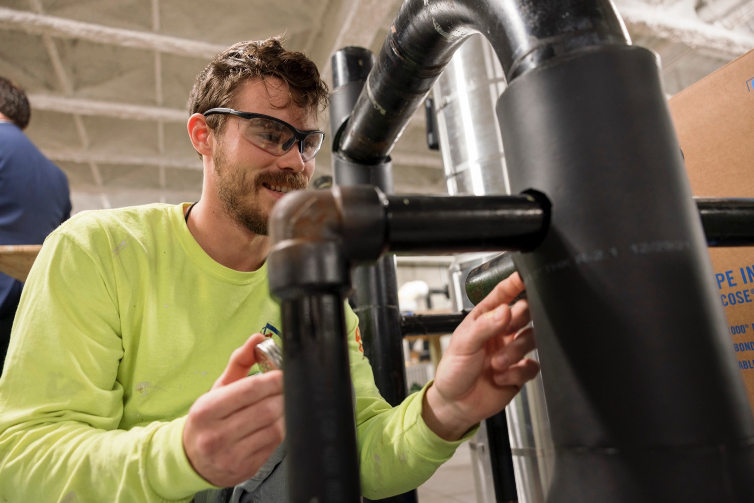 Jesse Welk, 27, works on a mock pipe following a press conference which kicked off National Apprenticeship Week with a visit to Heat and Frost Insulators Local 23, a training center in Dauphin County, on Monday, November 14, 2022. National Apprenticeship Week (NAW) is a nationwide celebration for industry, labor, equity, workforce, education and government leaders to showcase the successes and value of registered apprenticeship for building our economy, advancing racial and gender equity, and supporting underserved communities.<br><a href="https://filesource.amperwave.net/commonwealthofpa/photo/22344_li_apprenticeshipweek_NK_005.JPG" target="_blank">⇣ Download Photo</a>