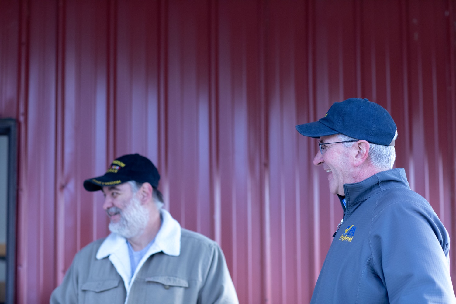 Larry Daugherty, US Army veteran and proprietor of Heritage Farms speaks with Agriculture Secretary Russell Redding. Agriculture Secretary Russell Redding and Brigadier General Mark Goodwill joined veterans and partners during visits to veteran-owned farms in Allegheny and Fayette counties. During the tours, Redding thanked farmer veterans for continuing to serve their communities through agriculture after returning from military service. November, 30, 2022 - McClellandtown, Fayette Co, PA.<br><a href="https://filesource.amperwave.net/commonwealthofpa/photo/22350_ag_workforceWeek_31.jpeg" target="_blank">⇣ Download Photo</a>