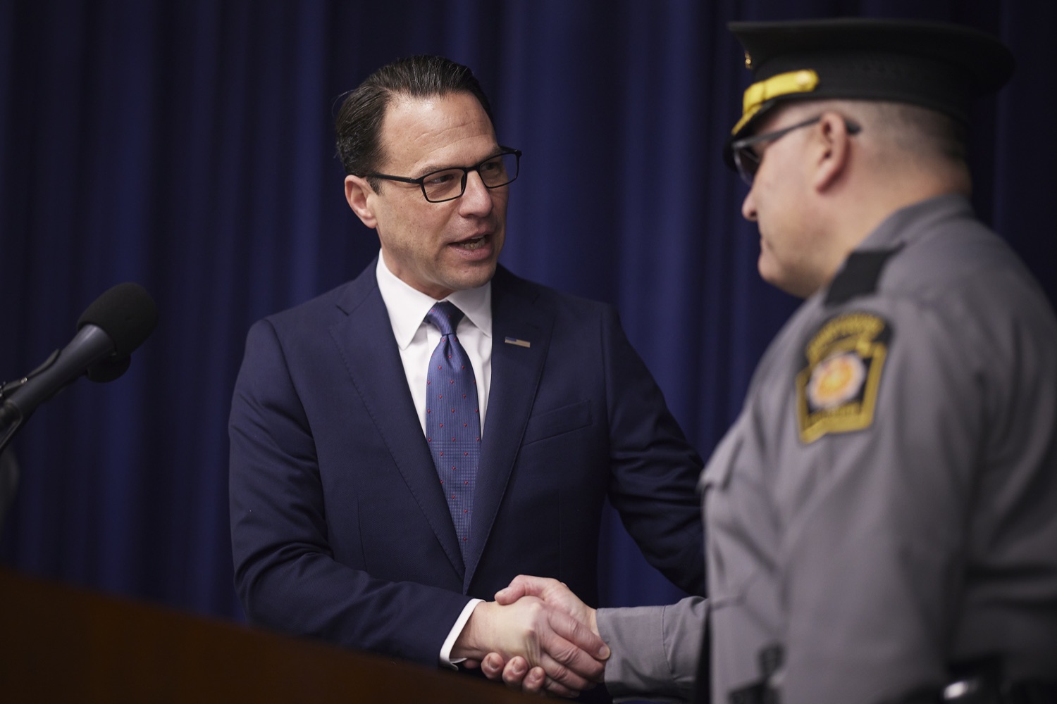 Pennsylvania Governor Josh Shapiro congratulating Pennsylvania State Police Commissioner Christopher Paris shortly after the Pennsylvania Senate confirmed his nomination.  Governor Josh Shapiro visits the Pennsylvania State Police Academy to meet the current classes of Cadets, tour the Academy, and hold a press conference to highlight the crucial investments his budget makes to support law enforcement and invest in public safety.  MARCH 08, 2023 - HERSHEY, PA<br><a href="https://filesource.amperwave.net/commonwealthofpa/photo/22760_gov_publicSafety_dz_0002.JPG" target="_blank">⇣ Download Photo</a>