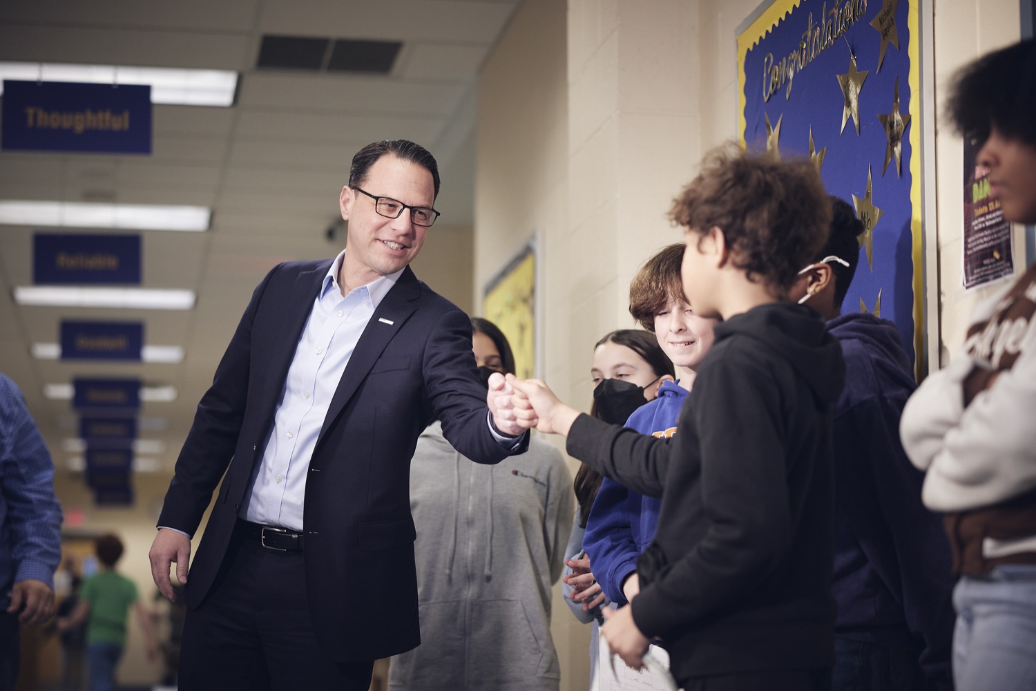Pennsylvania Governor Josh Shapiro spends time working with Colfax students.  Governor Josh Shapiro today shared his plans for rebuilding Pennsylvanias teacher workforce and making our schools better, healthier, and safer for Pennsylvania students during a visit to Pittsburgh Colfax K-8.  MARCH 21, 2023 - PITTSBURGH, PA<br><a href="https://filesource.amperwave.net/commonwealthofpa/photo/22804_gov_workforceTeachers_dz_0011.JPG" target="_blank">⇣ Download Photo</a>