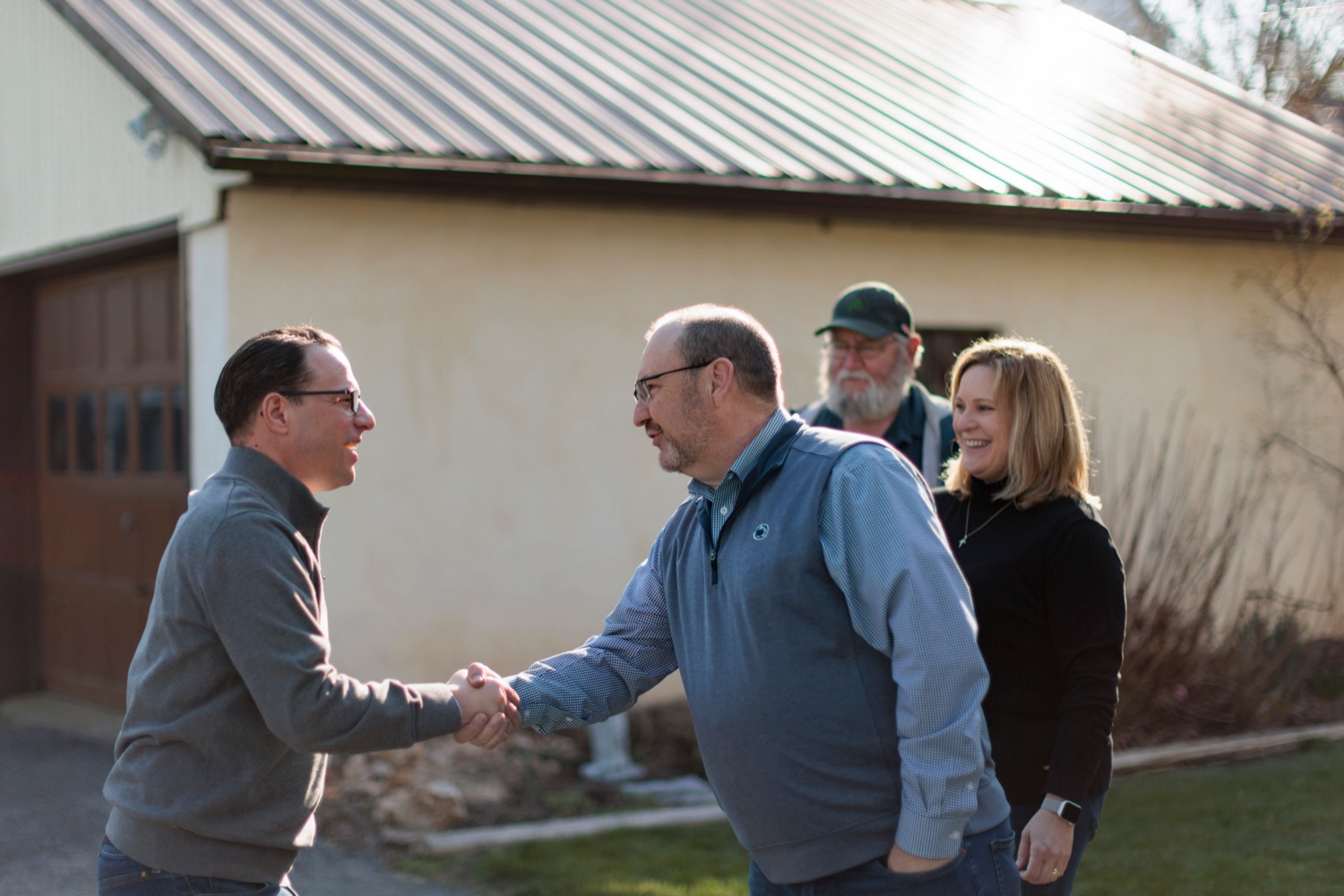 Governor Josh Shapiro shakes hands with Pennsylvania farmer Jim Shirk during a press conference, which to discussed the Commonwealths coordinated response to the Hi-Path Avian Influenza crisis and share the steps taken to support poultry owners as they protect their flocks, at Silver Valley Farm in East Earl on Wednesday, March 29, 2023.<br><a href="https://filesource.amperwave.net/commonwealthofpa/photo/22849_GOV_AvianFlu_NK_011.JPG" target="_blank">⇣ Download Photo</a>