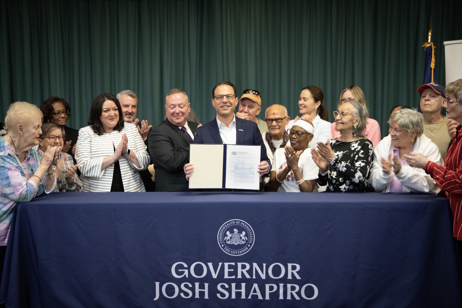 Governor Josh Shapiro signs an Executive Order on delivering services to older adults and people living with disabilities in Pennsylvania. This Executive Order signing is Governor Shapiros latest step in supporting Pennsylvania seniors by ensuring they have access to critical services  building on his commonsense budget proposal to expand the Property Tax/Rent Rebate program and help seniors across the Commonwealth stay in their homes. Pictured here is Governor Shapiro signing the Executive Order. Scranton, Pennsylvania. May 25, 2023.<br><a href="https://filesource.amperwave.net/commonwealthofpa/photo/23106_gov_aging_masterPlan_JP_01.jpg" target="_blank">⇣ Download Photo</a>
