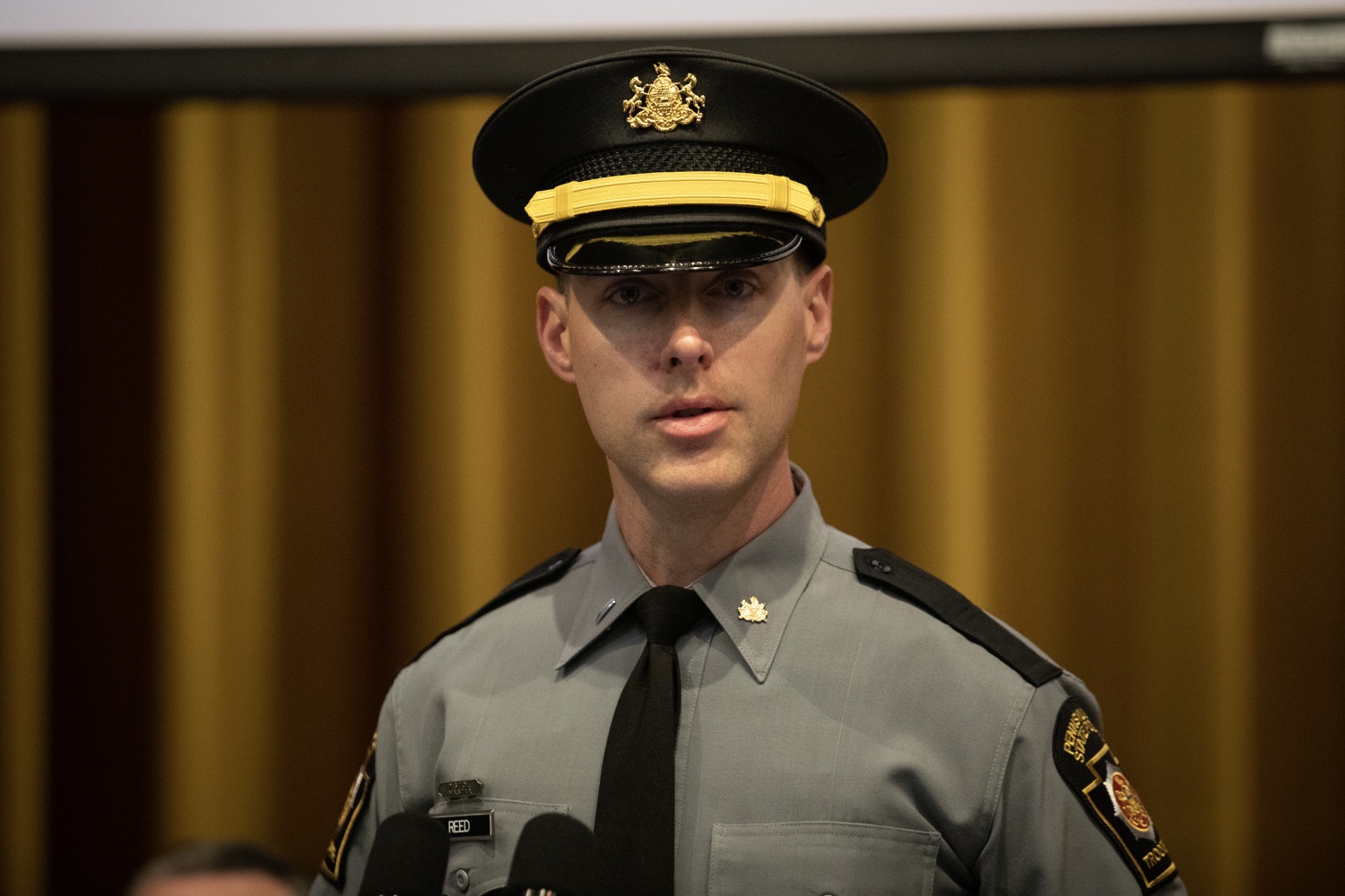 The Pennsylvania State Police joined Dr. Robin Engel of the National Policing Institute to present the 2022 findings of an independent study aimed at improving public safety, transparency, and policy by analyzing data from all traffic stops initiated by troopers. Pictured here is Lieutenant Adam Reed, delivering remarks at the joint press conference in Hershey, Pennsylvania. May 23, 2023.<br><a href="https://filesource.amperwave.net/commonwealthofpa/photo/23152_psp_contactData_JP_05.jpg" target="_blank">⇣ Download Photo</a>