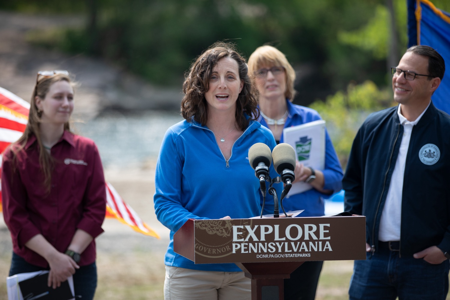 Sierra Fogal, President of Pocono Whitewater, joined Governor Josh Shapiro in visiting Lehigh Gorge State Park in Luzerne County to open a new park access point and highlight his budget's proposed investments in state parks, forests, and trails to make them safe and accessible for every Pennsylvanian.. .In March, the Governor unveiled his commonsense budget proposal filled with solutions to the most pressing issues Pennsylvanians face  including investments to make Pennsylvania communities safer and healthier, grow the economy, safeguard the environment, and support local businesses. . ."The Lehigh River provides accessible outdoor recreation for the entire tri-state area. It is a tourist destination that draws hundreds of thousands of tourists a year and provides an outdoor outlet to a diverse audience. This is only possible because of the work of the Department of Conservation and Natural Resources to protect and improve the state park so that it continues to thrive with increasing numbers of visitors," said Pocono Whitewater Operations Manager Sierra Fogal. "With the current support from the newly created Office of Outdoor Recreation, Director Hollis, Secretary Dunn, and Governor Shapiro, I'm confident that Pennsylvania will stay committed to these outdoor resources for our own personal enjoyment, as well as the tourism and outdoor recreation industry that is a main economic driver in this region." .<br><a href="https://filesource.amperwave.net/commonwealthofpa/photo/23155_GOV_LehighGorge_ERD_026.jpg" target="_blank">⇣ Download Photo</a>