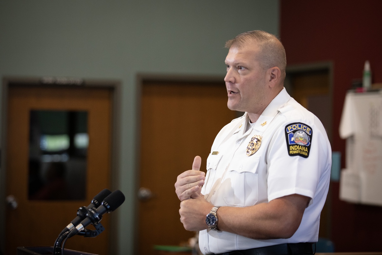 The Pennsylvania Commission on Crime and Delinquency (PCCD), visited the Indiana Area School District to highlight their work with School Mental Health & Safety and Security funding provided through PCCDs School Safety and Security Committee, and to encourage schools to participate in the 2023-24 Pennsylvania Youth Survey (PAYS). Pictured here is Justin Schawl, Indiana Borough Chief of Police, delivering remarks during the event. Harrisburg, Pennsylvania. September 15, 2023.<br><a href="https://filesource.amperwave.net/commonwealthofpa/photo/23673_pccd_indianaSD_JP_17.jpg" target="_blank">⇣ Download Photo</a>
