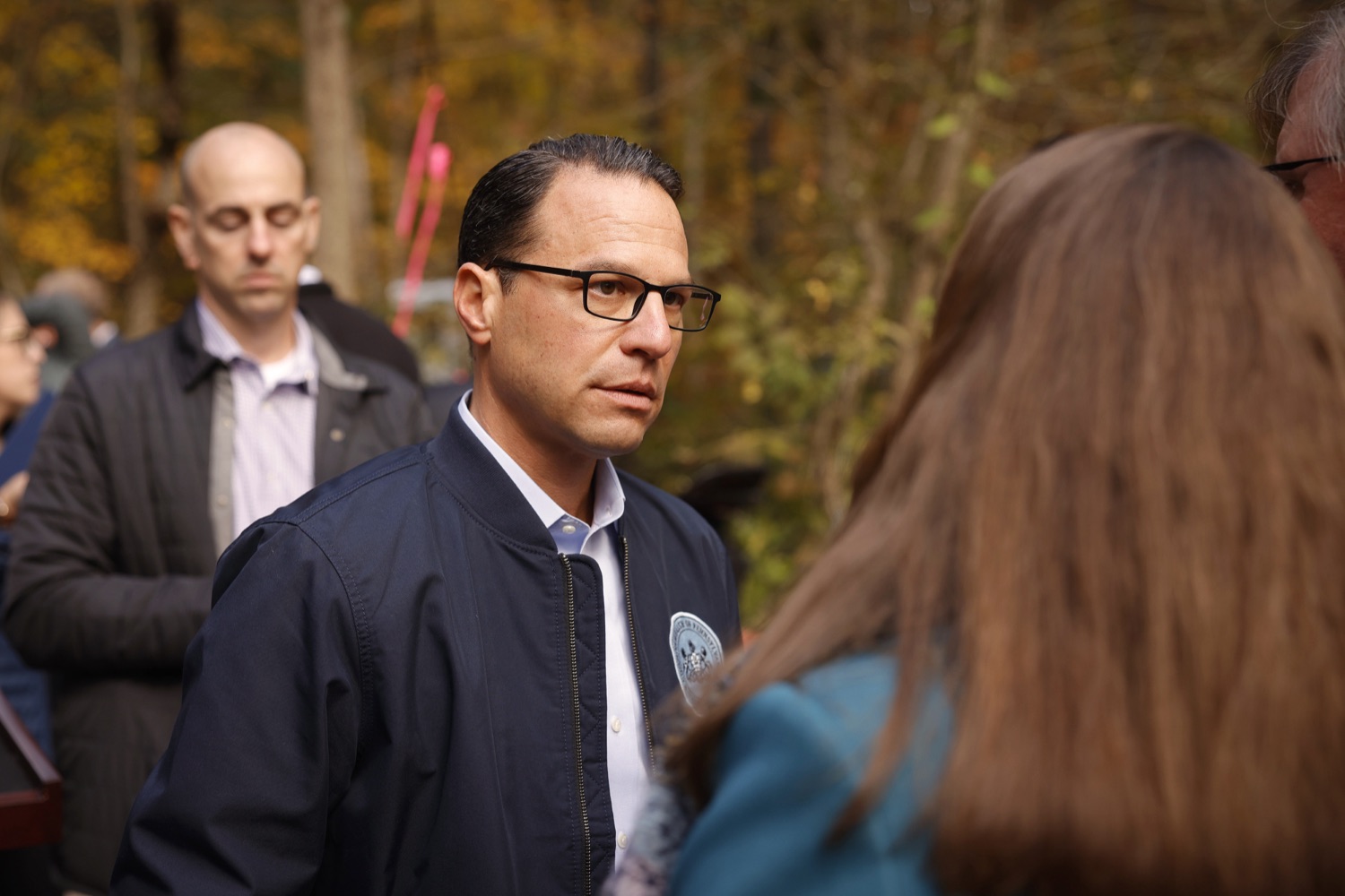 Pennsylvania Governor Josh Shapiro speaks to  Amanda Leland.    Governor Josh Shapiro, the PA Department of Environmental Protection (DEP), Environmental Defense Fund (EDF), and the Pennsylvania Environmental Council (PEC) highlighted the Shapiro Administration's historic work to cap and plug orphaned and abandoned oil and gas wells across Pennsylvania. OCTOBER 18, 2023 - BURGETTSTOWN, PA<br><a href="https://filesource.amperwave.net/commonwealthofpa/photo/23921_gov_100thwell_dz_028.JPG" target="_blank">⇣ Download Photo</a>