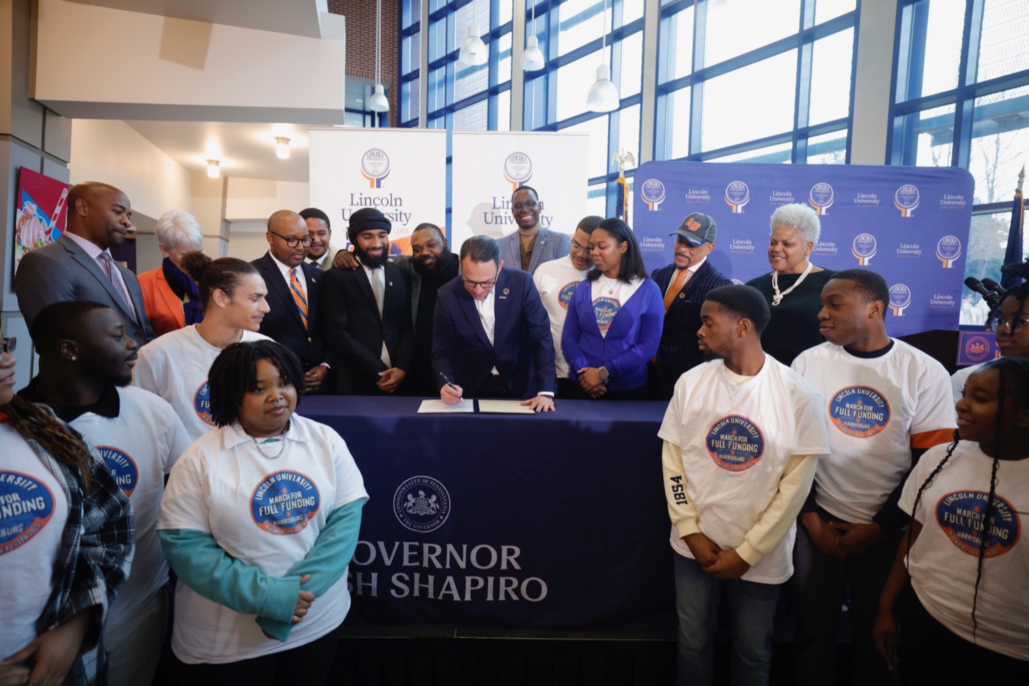Governor Josh Shapiro joined Secretary of Education Dr. Khalid Mumin, Rep. Jordan Harris, Sen. Vincent Hughes, Sen. Carolyn Comitta, Lincoln University President Brenda Allen and Lincoln University students and staff for a ceremonial bill signing of House Bill (HB) 1461, which provides state funding for Lincoln University and other state-related universities.<br><a href="https://filesource.amperwave.net/commonwealthofpa/photo/24135_gov_HB1461_14.jpeg" target="_blank">⇣ Download Photo</a>