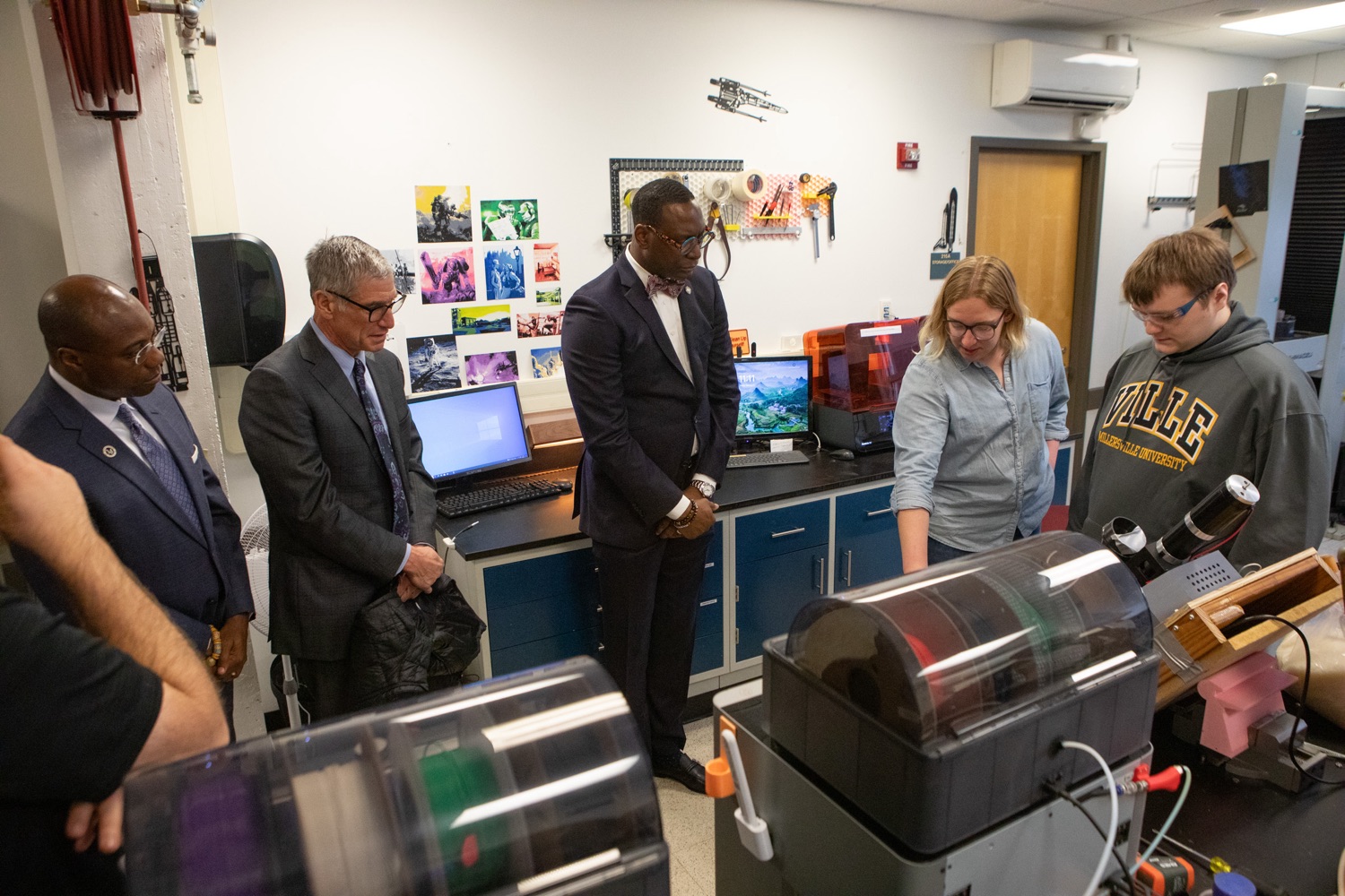 PDE Secretary Dr. Khalid N. Mumin takes a tour of the 3D printing area and learned how Millersville students are leaving the university with an array of job opportunities in high-paying, high-demand careers. ..Pennsylvania Department of Education (PDE) Secretary Dr. Khalid N. Mumin and Deputy Secretary Dr. Kate Shaw joined Pennsylvania State System of Higher Education (PASSHE) Chancellor Dan Greenstein at Millersville University to highlight Governor Shapiros proposed investments in higher education and how Pennsylvanias public postsecondary system is preparing students to be workforce-ready upon graduation.. .Governor Shapiros blueprint for higher education will help Pennsylvanias public universities build on areas of strength and address the challenges caused by a 30-year disinvestment in higher education by the Commonwealth, such as competition between universities that results in higher costs and lower enrollment. Governor Shapiros blueprint will ensure better coordination across PASSHE universities and community colleges to expand access to affordable, workforce-ready credentials and degrees across Pennsylvania  including in areas that currently lack access.. .Our Commonwealths institutions of higher education, like Millersville University, do an incredible job preparing students for the future and connecting them with future opportunities, said Secretary Khalid N. Mumin. Governor Josh Shapiros new blueprint for higher education will end the era of disinvestment in our higher education sector, make postsecondary education more accessible and affordable to more Pennsylvanians, and allow these schools to continue to do what they do besteducate learners..<br><a href="https://filesource.amperwave.net/commonwealthofpa/photo/24436_PDE_Blueprint_ERD_046.jpg" target="_blank">⇣ Download Photo</a>